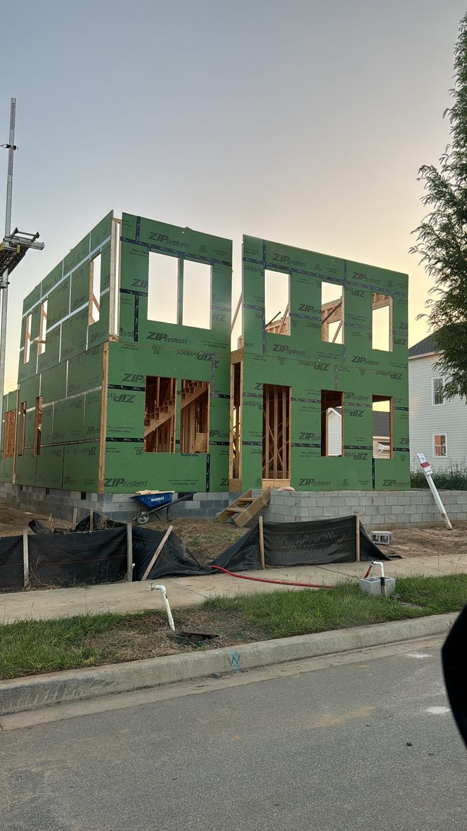 New build framed and sheathed, exterior underway