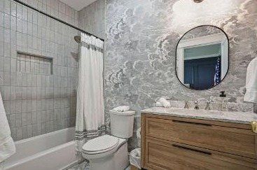Bath with soaking tub